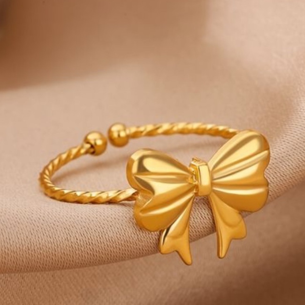 **Exquisitely Delicate S925 Golden-Tone Bow adjustable with Twisted Design